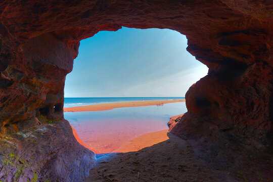 view from inside cave thunder cove PEI - Powered by Adobe