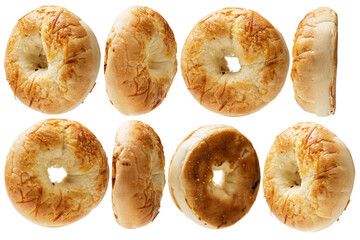 Closeup view of a set collection of bagel breads in various kinds of angles isolated over a white background