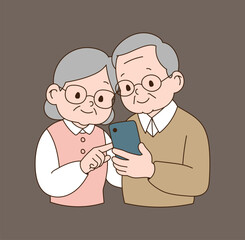 An elderly couple who look at their smartphones together and use them.