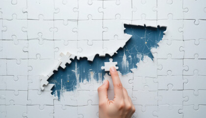 Hand Placing Last Piece of Puzzle in Missing Section with Blue Background Symbolizing Completion and Achievement