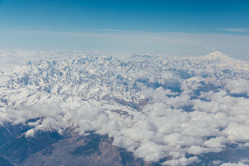 Landscape on the tops of the mountains of the Caucasus from an airplane elluminator