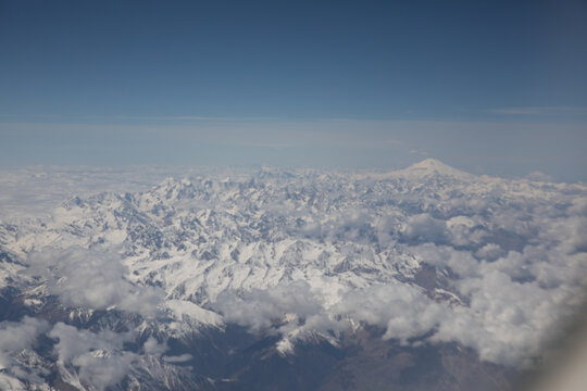 Landscape on the tops of the mountains of the Caucasus from an airplane elluminator