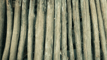 Old Wooden Poles Texture – Natural Rustic Timber Background.