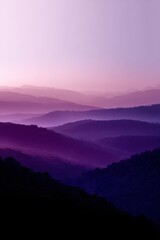 Obraz premium Serene Cliffside Landscape Bathed in Purple Ambient Light
