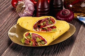 Burrito with tuna and vegetables wrap