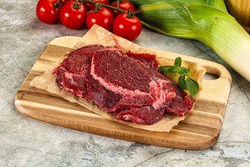Raw beef cheeks cut for cooking