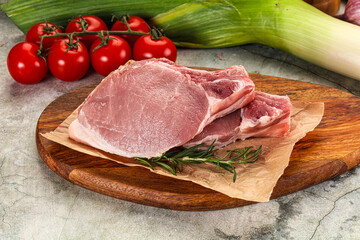 Raw pork steak loin with bone