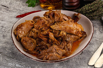 Shredded slow cooked pork meat