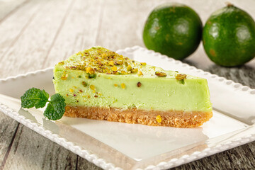 Green pistachio cheesecake served mint
