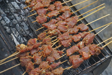 Raw beef satay, satay is a traditional food from Java, Indonesia.