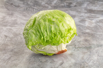 Obraz premium Raw iceberg salat over background