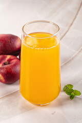 Vitamin beverage - peach juice glass