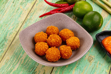 Fried crispy yellow cheese balls
