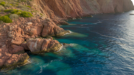 Massif de l'Esterel -Theoule sur Mer -Pointe de l'Aiguille. Esterel Mediterranean coast of red rocks, beach and sea. French Riviera on the Côte d'Azur