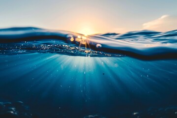 Tranquil ocean waves gently rolling on a deep blue water surface under the clear sky