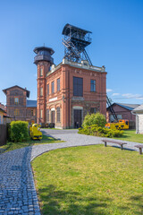 Sevcinsky mine in Brezove Hory showcases striking architecture and mining equipment. This historic site reflects the rich mining heritage of Czechia, inviting visitors to explore its past.