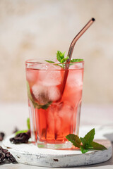 Hibiscus iced tea. Agua de Jamaica or roselle mocktail drink, summer beverage