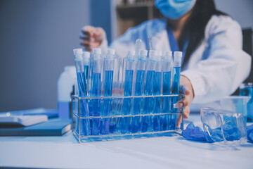 Research, experiment and medical trial being done by a scientist in a lab, science facility or...