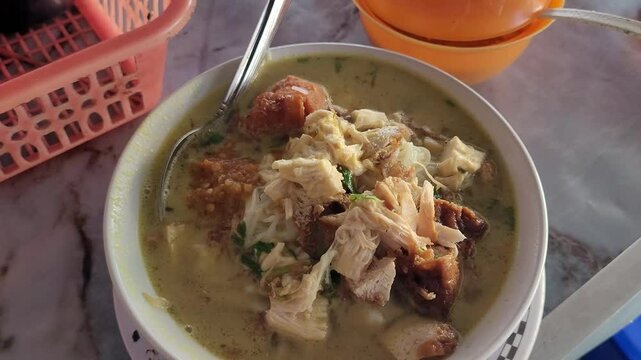 Nasi lesah, indonesia gourmet made from light s coconut milk oup with chicken
