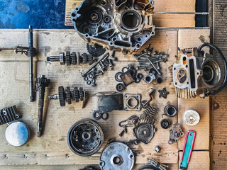 Old parts of motorcycles background. Repair and maintenance old parts of engine. Old motorcycle...