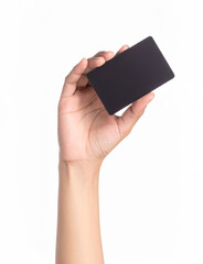 Woman hand holding blank black credit card on white background