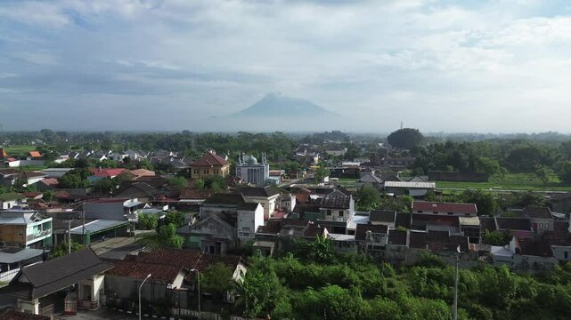4K aerial drone footage of Mount Merapi view from residental area