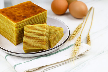 Lapis Legit or Spekkoek, One of Indonesian traditional layered cake. Lapis legit especially served...