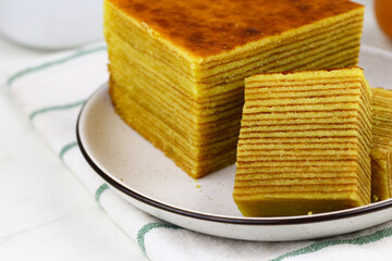 Lapis Legit or Spekkoek, One of Indonesian traditional layered cake. Lapis legit especially served...