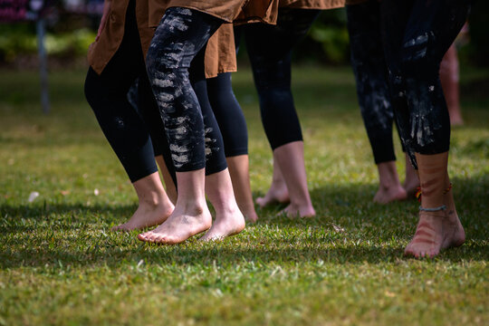 Indigenous teenagers performing a cultural dance
