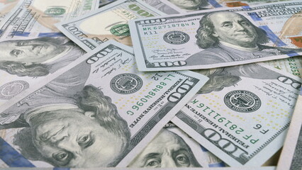 A Highly Detailed CloseUp Image Depicting US Dollar Bills Neatly Piled Together in a Display