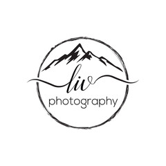 Mountain photography logo featuring rugged peaks and a camera lens, ideal for outdoor and adventure photographers. Represents nature, creativity, and stunning visual storytelling.

