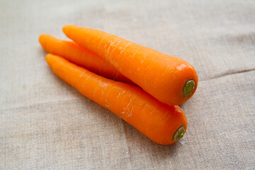 fresh summer vegetables on a linen tablecloth, carrot