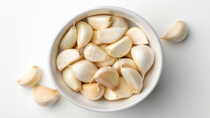 Garlic in bowl in white background, Garlic clove in bowl isolated in white background Top View
