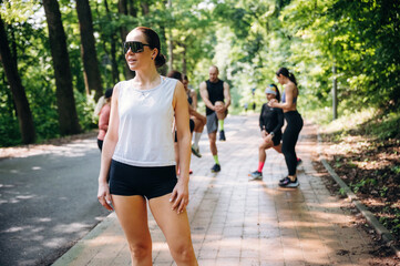 Group of runners are together outdoors