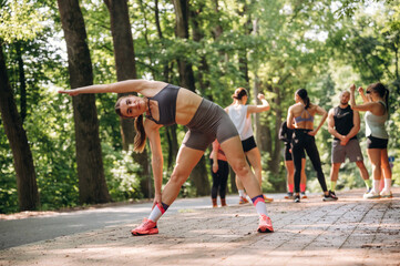 Warm up exercise. Group of runners are together outdoors