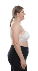 Fototapeta premium Weight loss. Plus size woman on white background