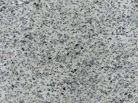 Rugged Elegance: Close-Up of Speckled Grey Granite with Natural Textures