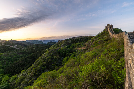 Great Wall of China and mountains at sunrise