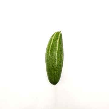 Potol or pointed gourd vegetable on isolated white background. Pointed gourds over white background. Green vegetable. High resolution image.