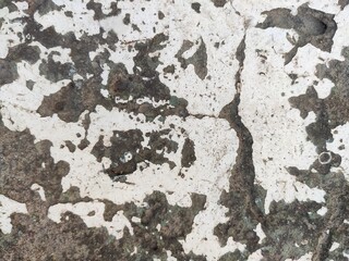 Weathered concrete surface ideal for grunge textures, design backgrounds, and construction-related...
