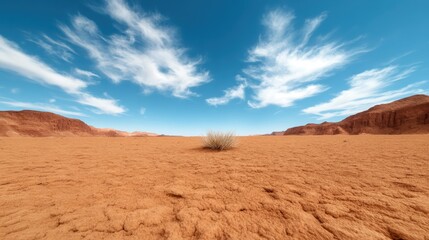 Fototapeta premium An expansive desert landscape showcasing a single bush against a clear blue sky, symbolizing resilience and stark beauty in nature's harshest environments, evoking deep contemplation.