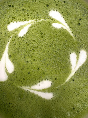 Five hearts in a circle as matcha latte art