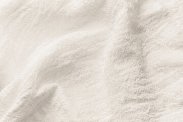  White wrinkled linen fabric texture background close up