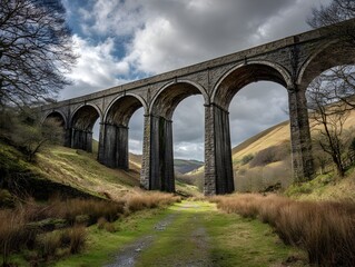 Fototapeta premium Discover the Grandeur of a Historic Railway Viaduct in a Wide-Angle Shot Spanning Scenic Horizons