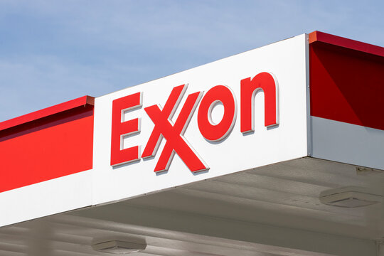 Charlotte, NC, USA - June 19, 2022: Exxon logo is seen at one of its gas stations. Exxon Mobil Corporation is an American multinational oil and gas corporation headquartered in Spring, Texas.