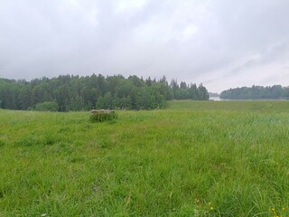 Bubiai hill during cloudy day. Small hill. Grass is growing on hill. Staircase leading to the top....