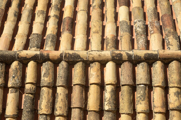 Old colorful mediterranean tile rooftop closeup