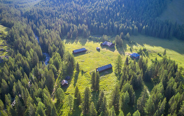 Old wooden border outpost cordon near Altai river Upper Kulash. Camera looks down.