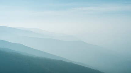 Blue hazy mountains receding into the distance