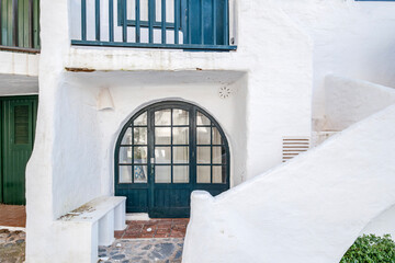 Classic Whitewashed Architecture In Binibeca Vell With Arched Door And Staircase. Menorcan Coastal Village, Traditional Design, Spanish Island Charm